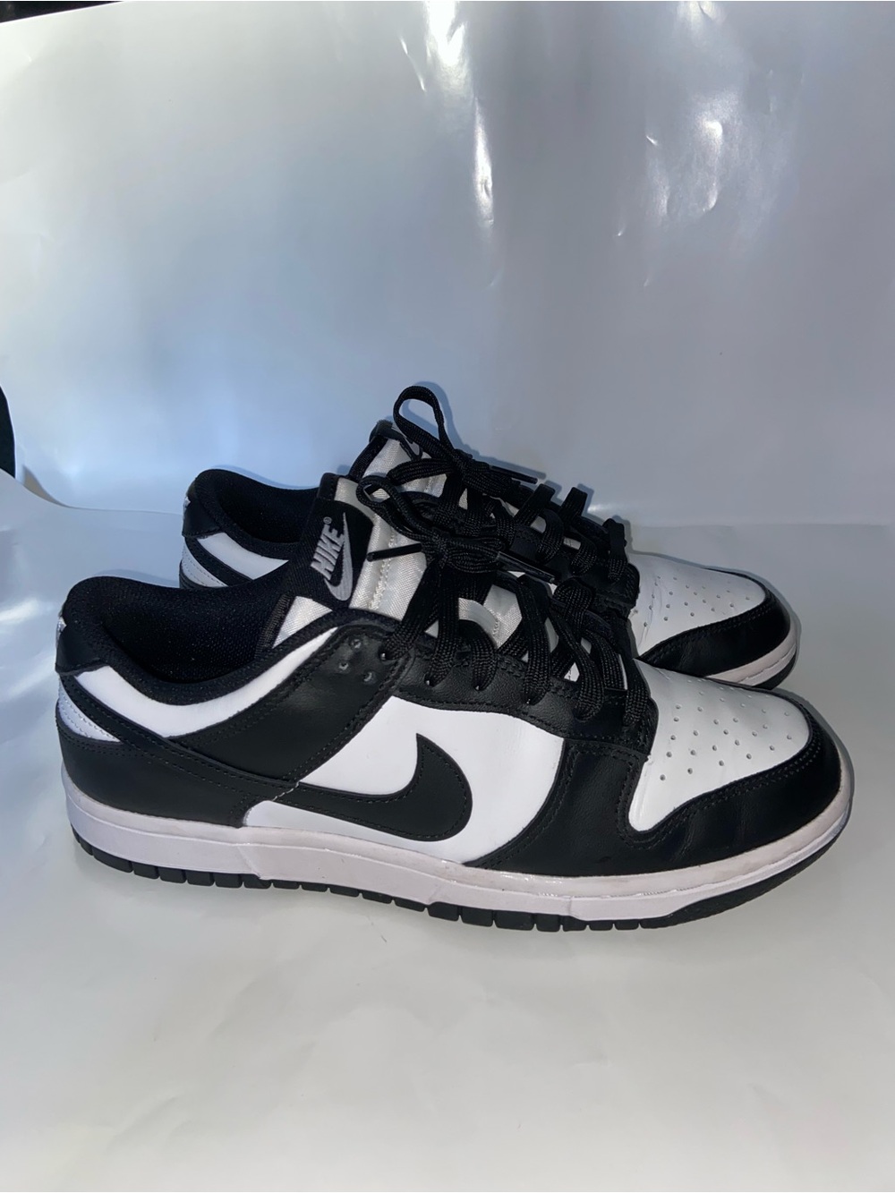 Nike Women’s Black and White Low-Top Sneakers - Swoosh Design